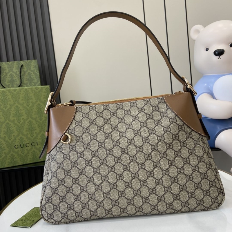 G*u*i top handle bags